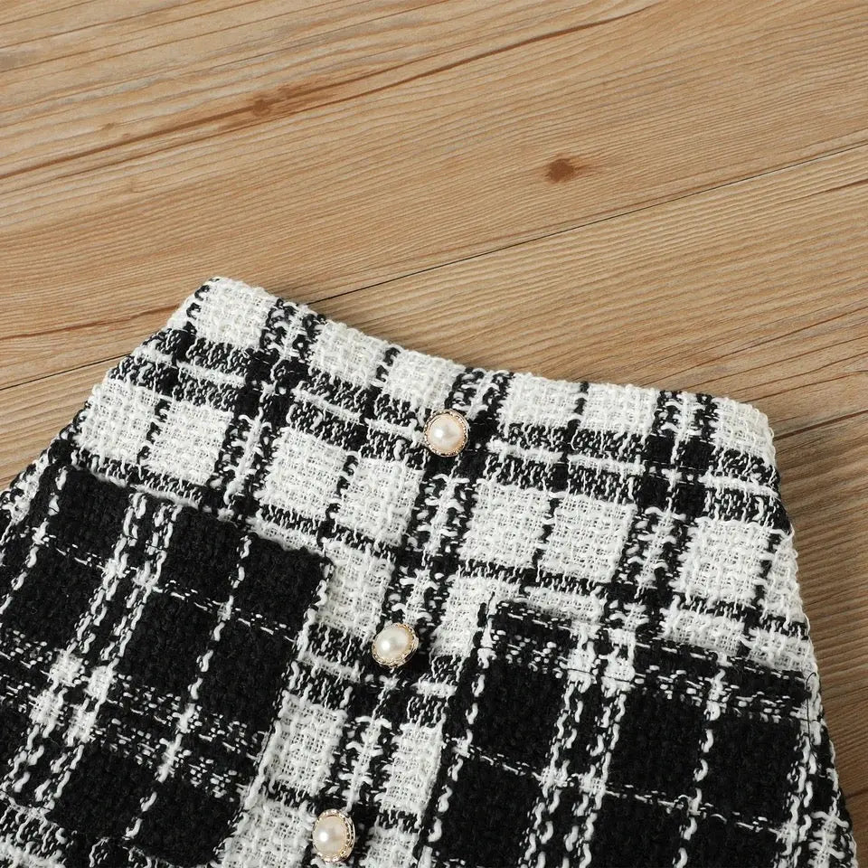 Girls Black Top With Tweed Skirt And Bow